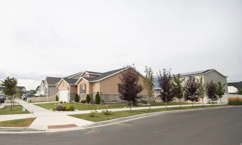Contemporary residential architecture with a stone and siding exterior