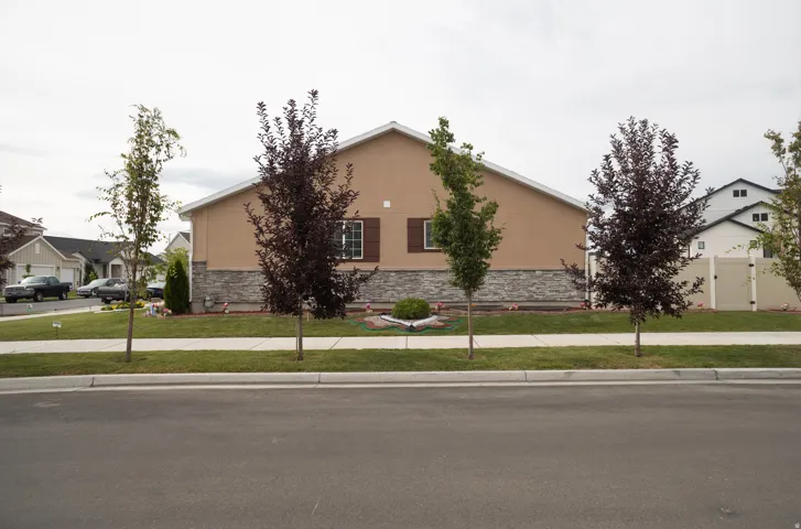 Stucco exterior with a stone veneer accent
