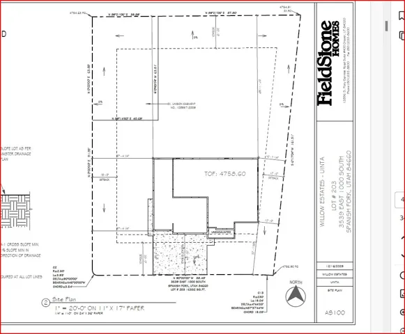 Site Plan. Depicting the property boundaries, building footprint, utility locations, and dimensional annotations for the parcel