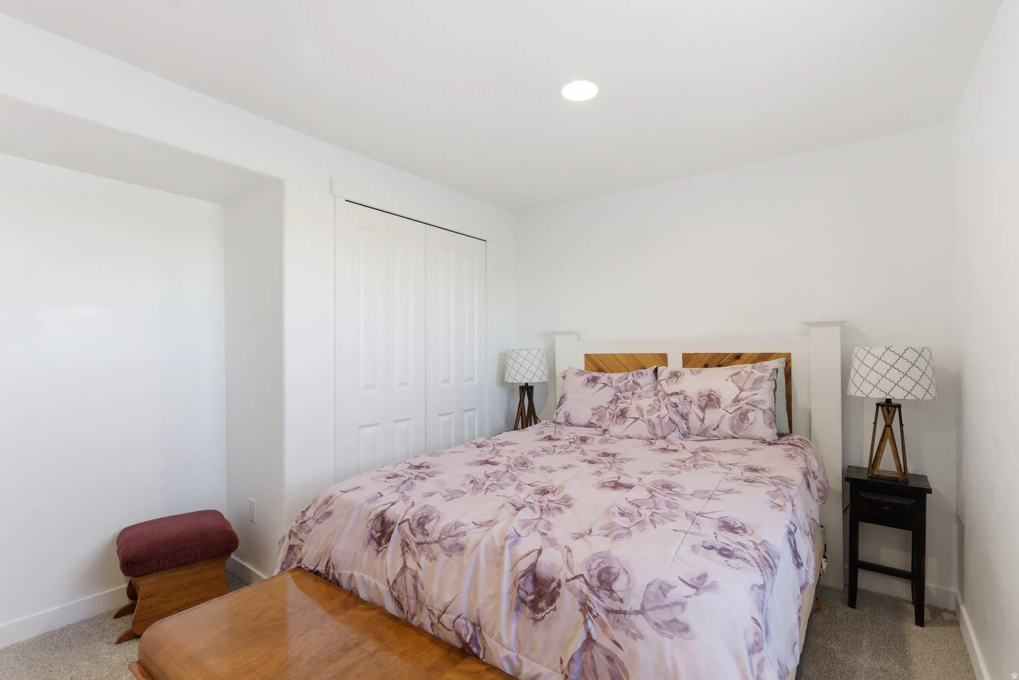 White walls with carpet flooring