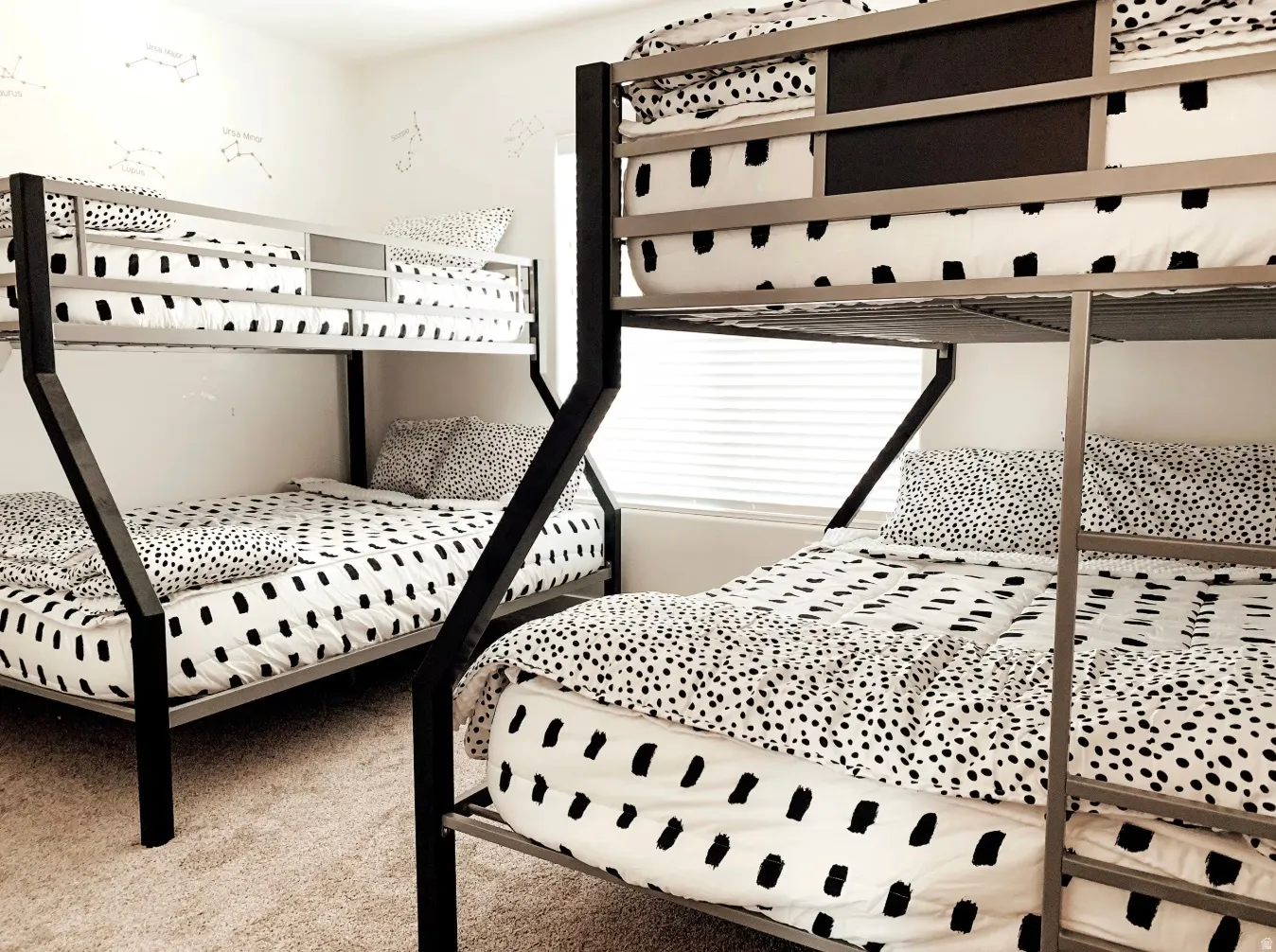 Wall-to-wall carpeting and neutral wall tones