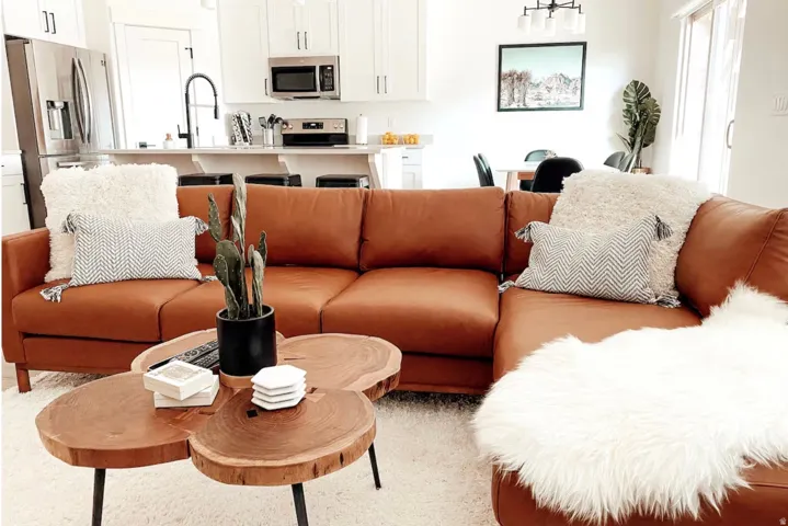 Open-concept living area with wood-finish flooring