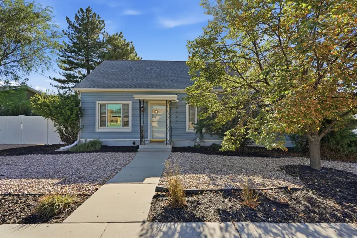 Low maintenance Xeriscaped front yard with mature trees