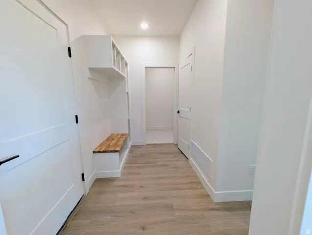 Built-in storage bench with wood-finish top