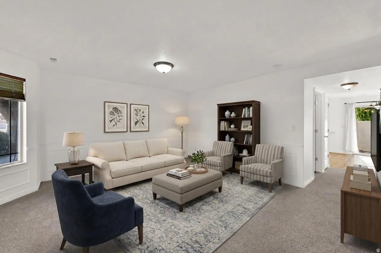 Recessed lighting, window with horizontal blinds, decorative wainscoting, and carpeted flooring