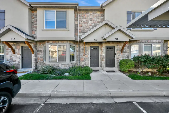 Stone and stucco exterior with multiple entry points