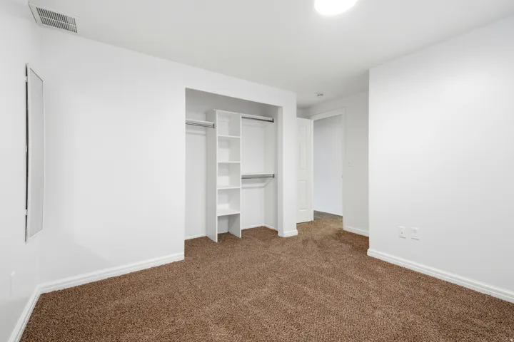 Built-in closet shelving and hanging rods