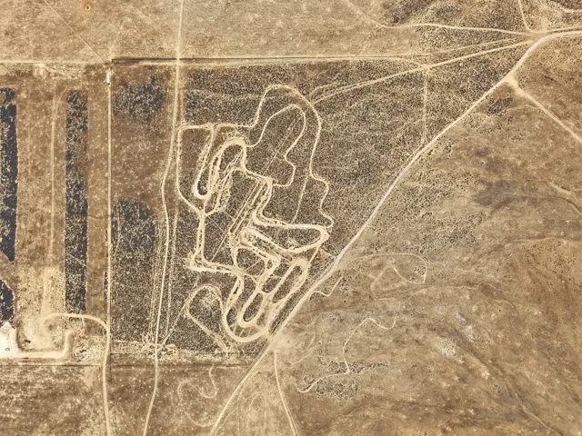 Aerial Image. Depicting the property from an elevated perspective, highlighting land usage and features