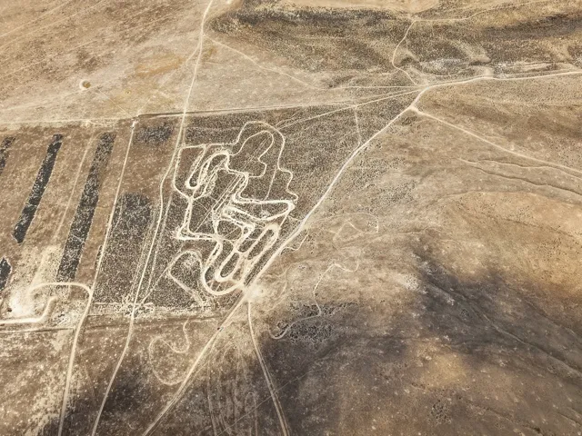 Aerial Survey. Depicting a portion of the property with visible ground markings and tracks
