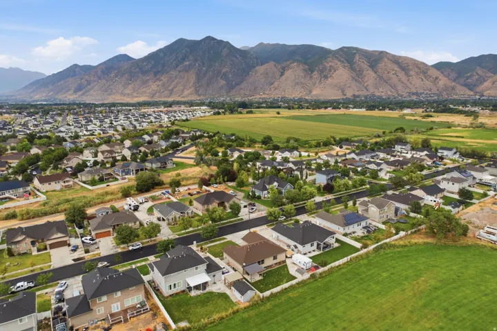 Expansive residential area with mountain scenery and green spaces