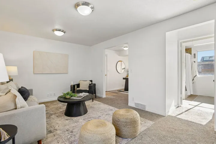 Wall-to-wall carpeting and neutral wall tones