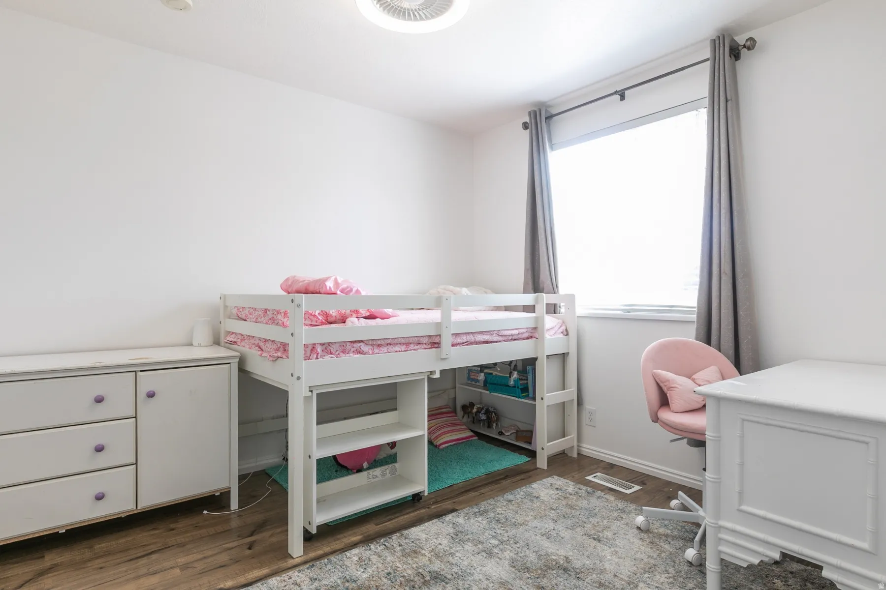 Wood-finish flooring with white walls