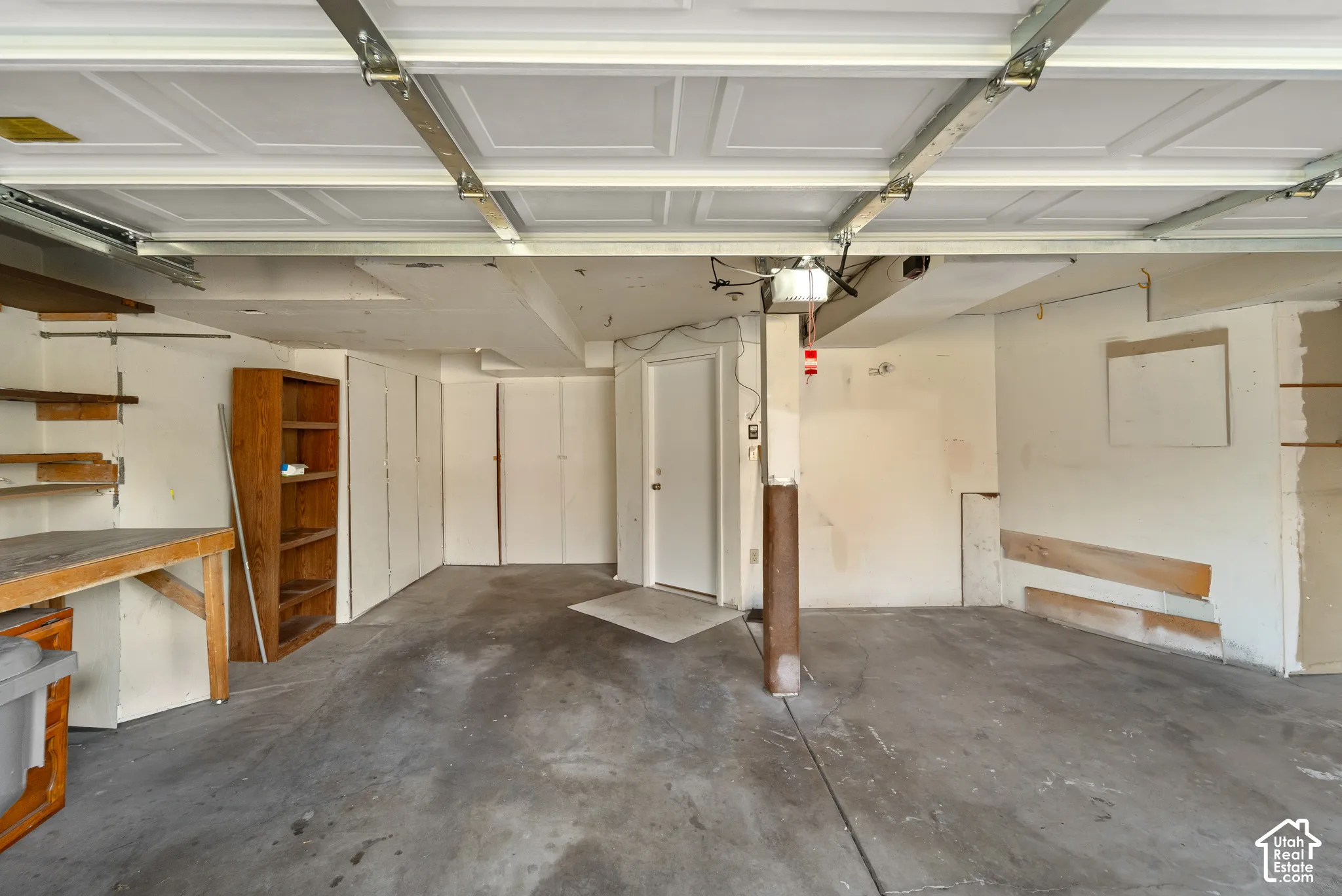 The garage is over sized and has lots of built in storage closets.