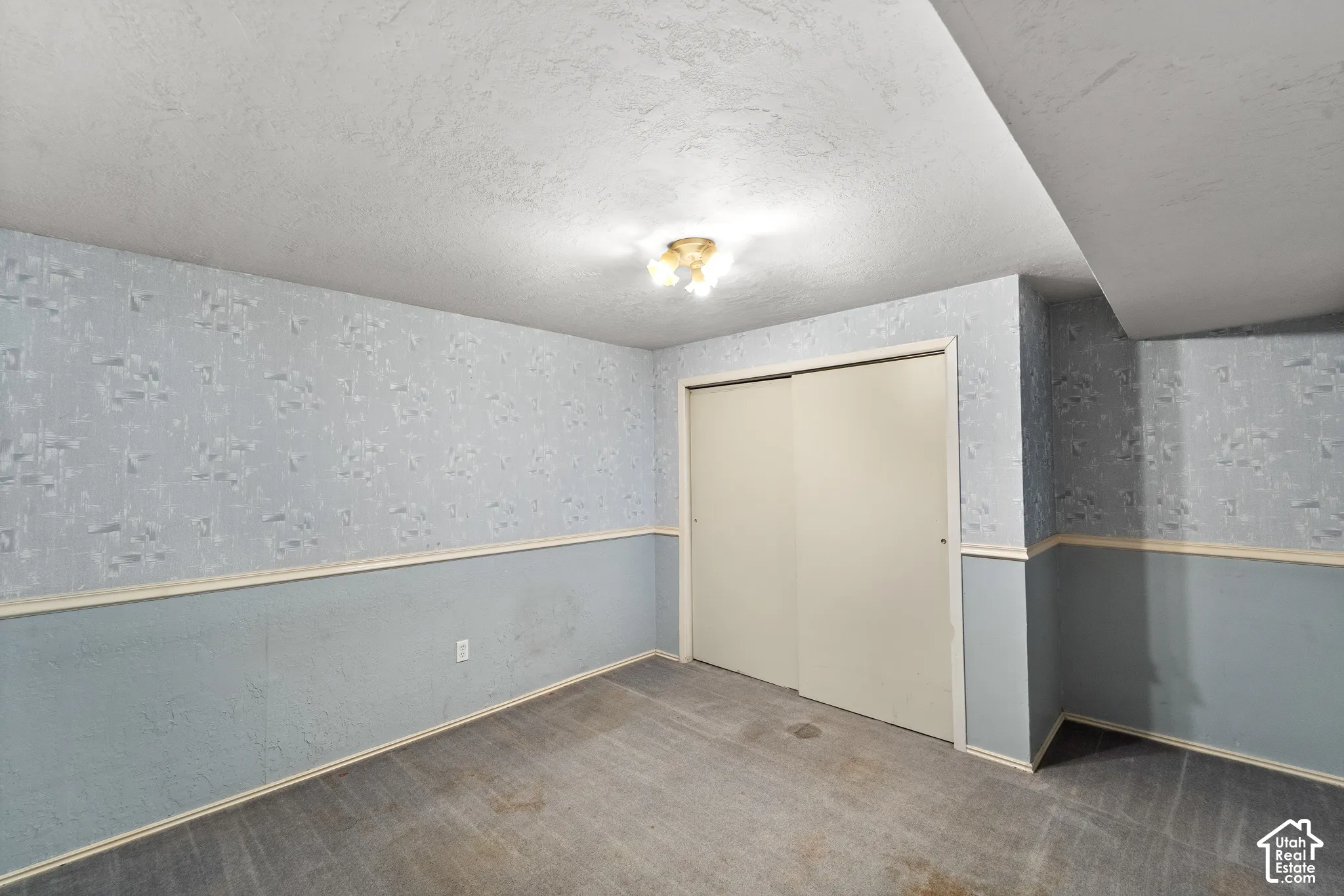 The third bedroom  is also quite large and could be used as a family room as well. The entry from the garage is street level so many of these homes have the ability to have a mother in law apartment as well.