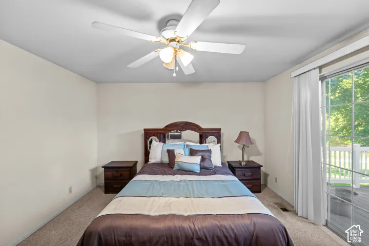 The large primary bedroom has direct access to the deck and had a large walk in closet.