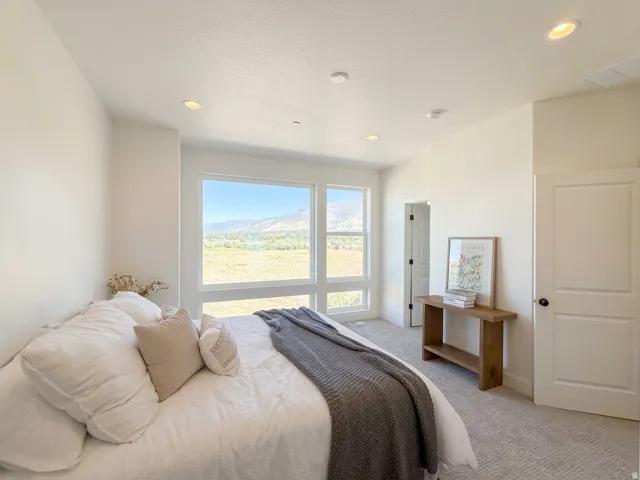 Primary suite with walk in closet, plenty of natural light and ensuite bathroom.