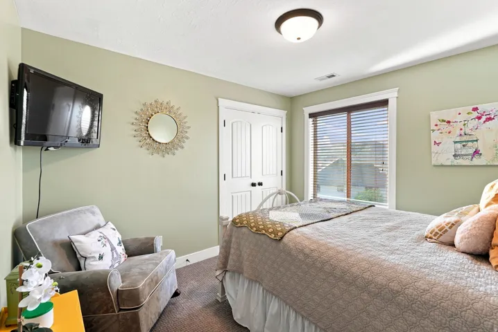 Window with horizontal blinds and white trim