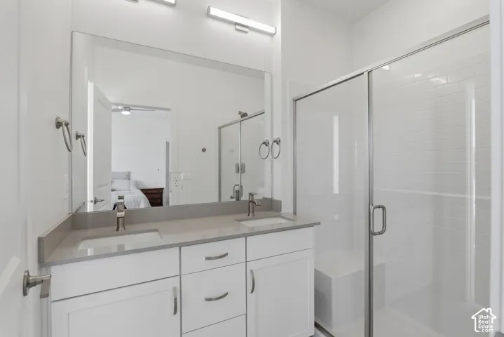 Dual vanity with integrated sinks and a stone-finish countertop
