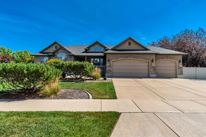 Stucco and brick exterior with a stone accent facade