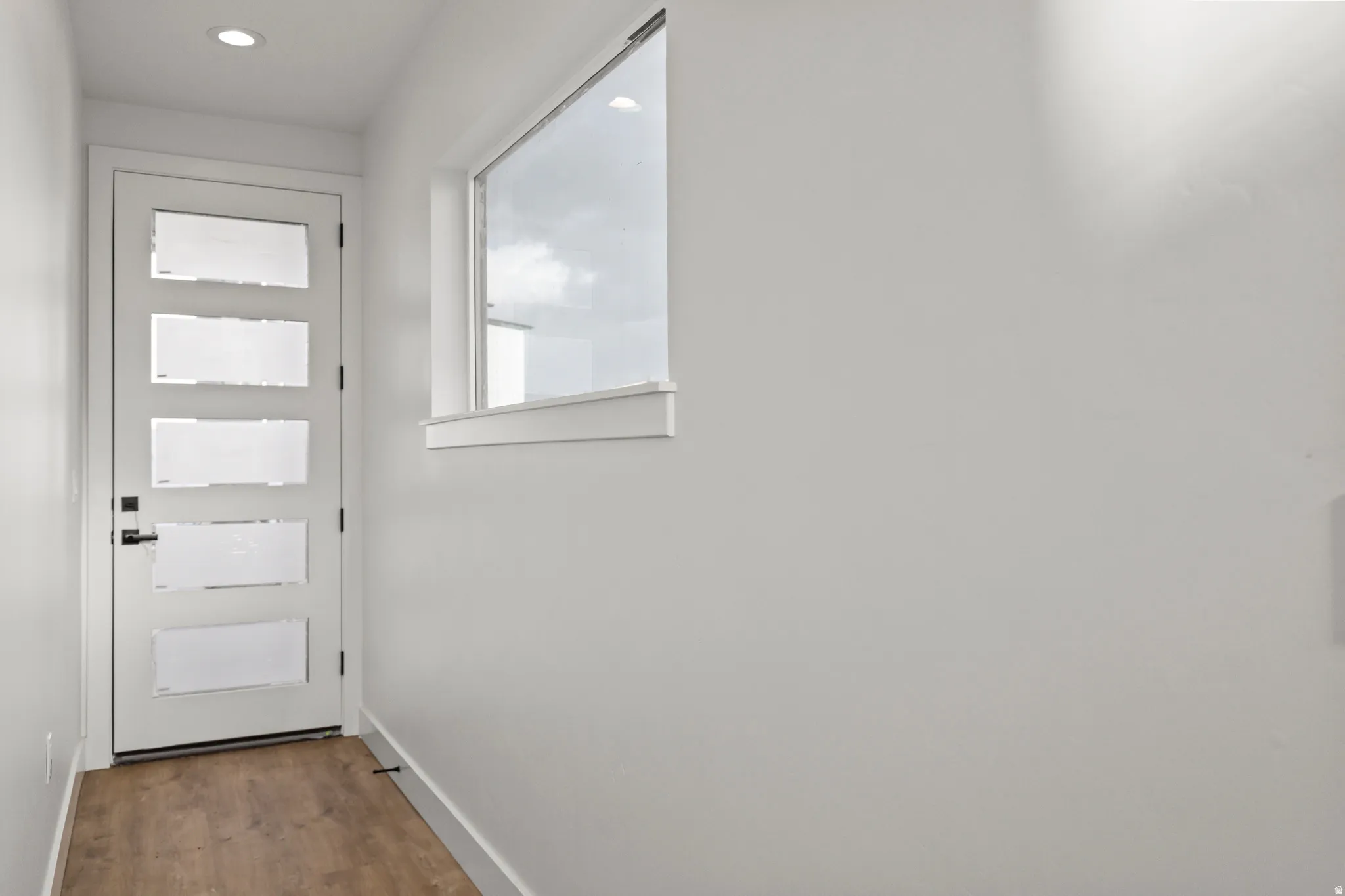 Modern entry door with multiple frosted glass panels