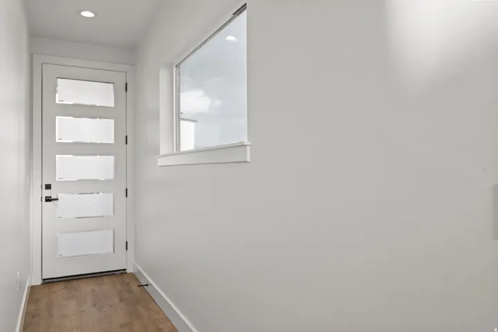 Modern entry door with multiple frosted glass panels