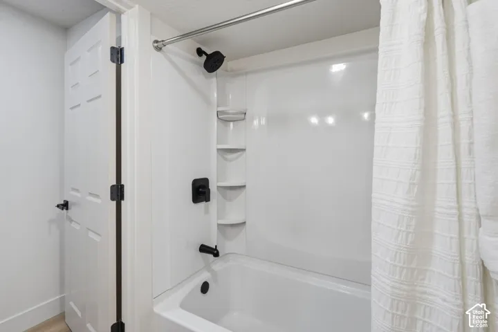 White paneled door with matte black hardware