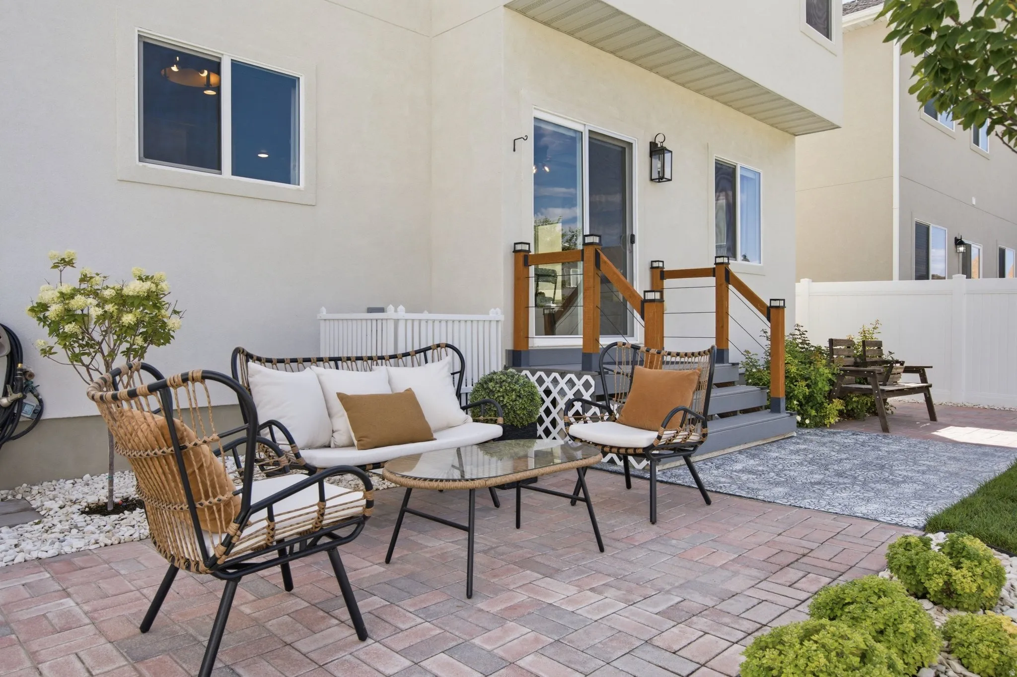 Patio area featuring brick pavers