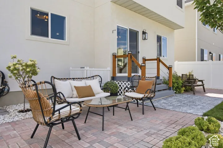 Patio area featuring brick pavers
