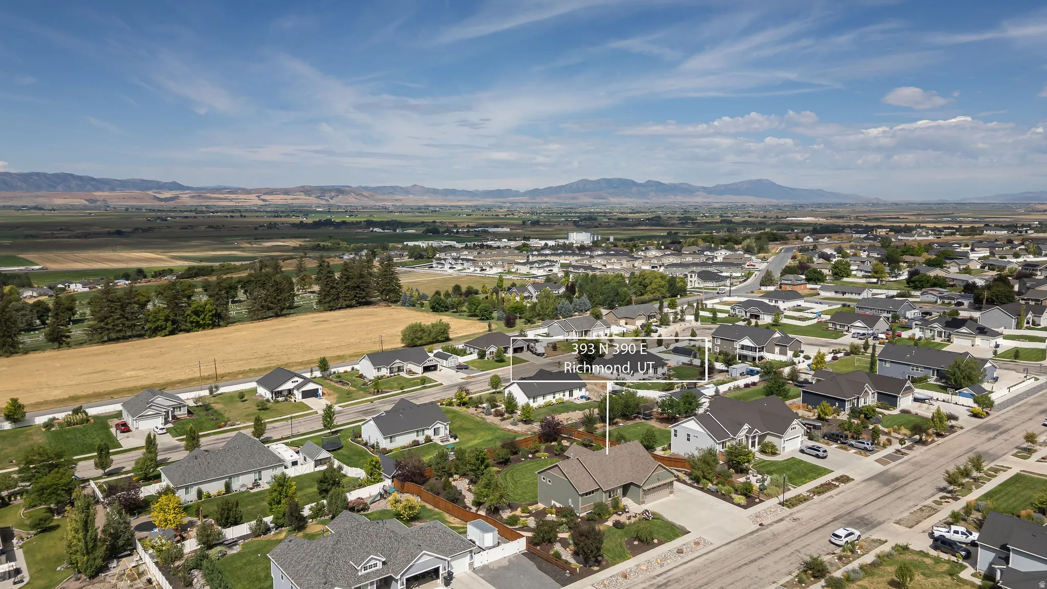 Residential neighborhood setting with distant mountain scenery