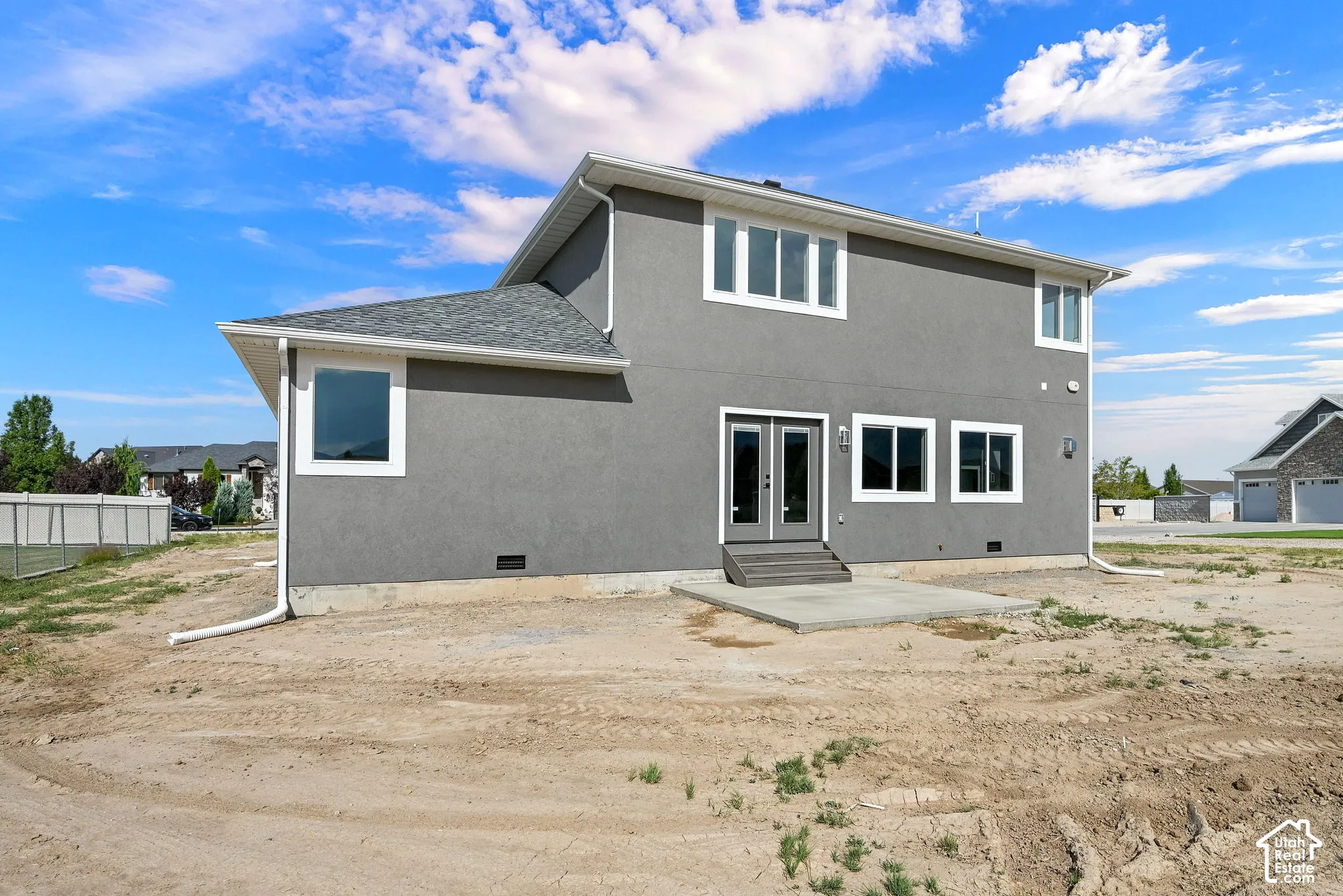 Stucco on the rear exterior is easy to maintain and gives the home an upscale finish.