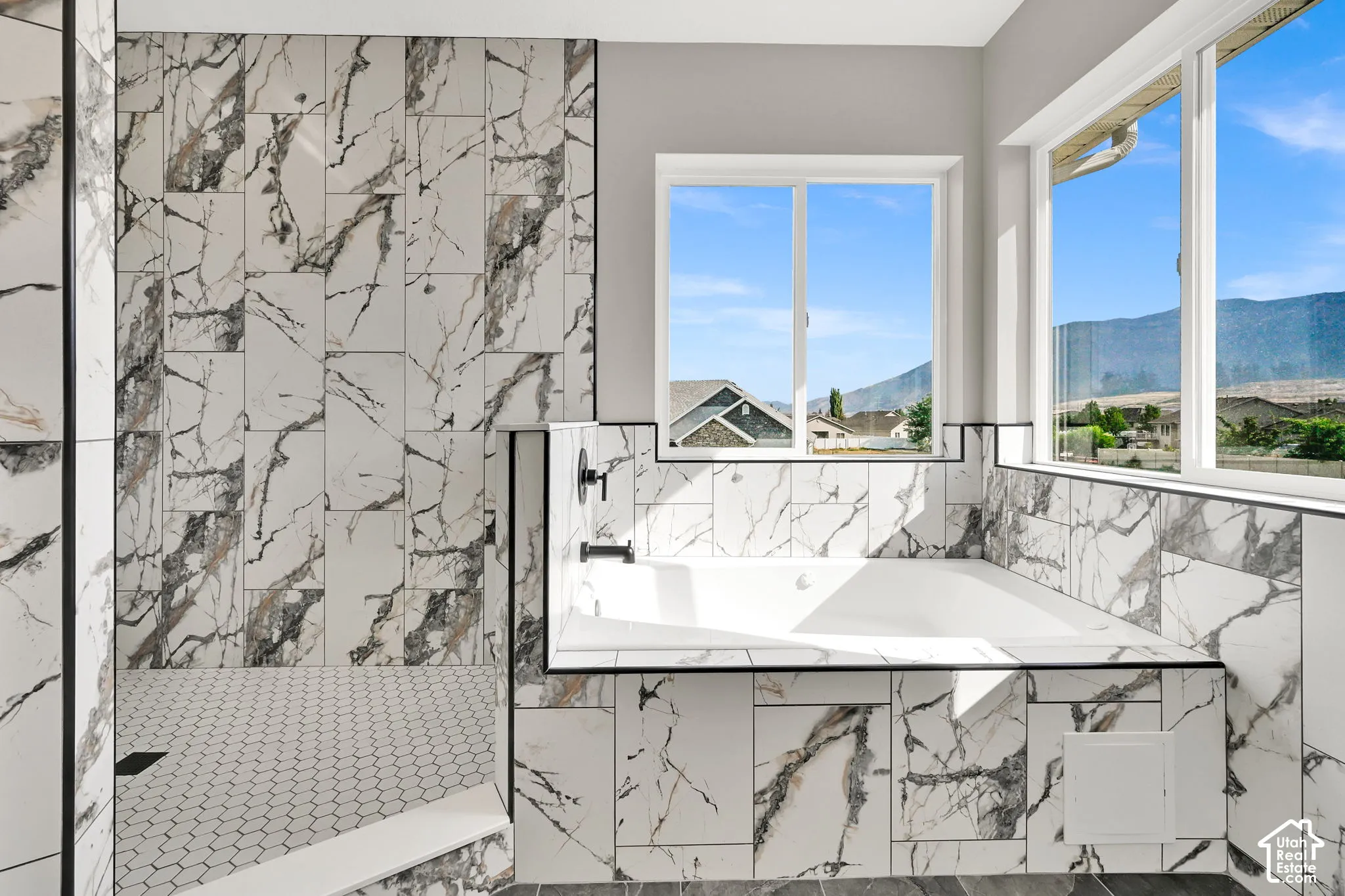 Relax in the jetted tub with views!  or shower in this beautiful oversized shower.