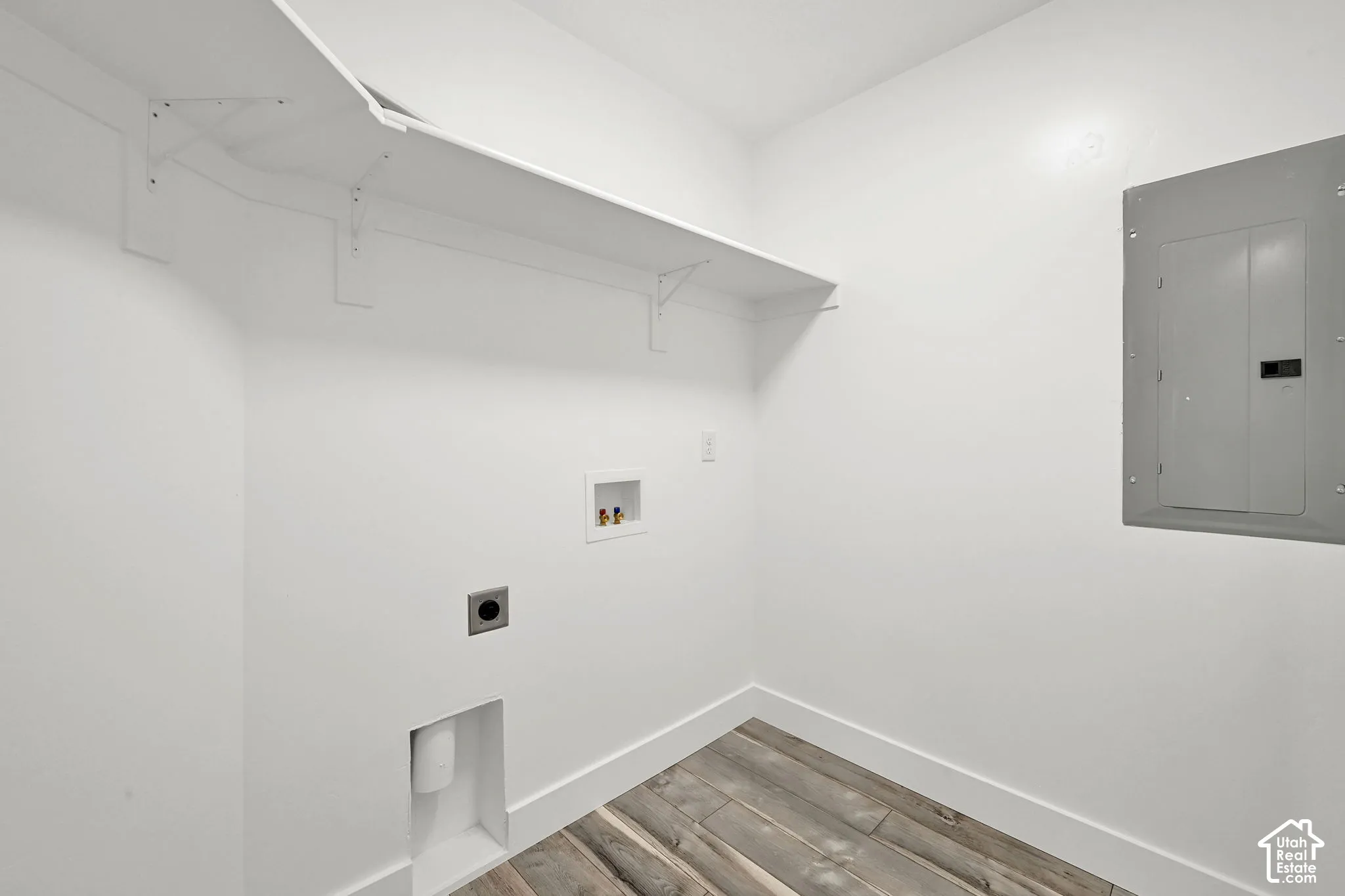 Laundry room is conveniently located upstairs.
