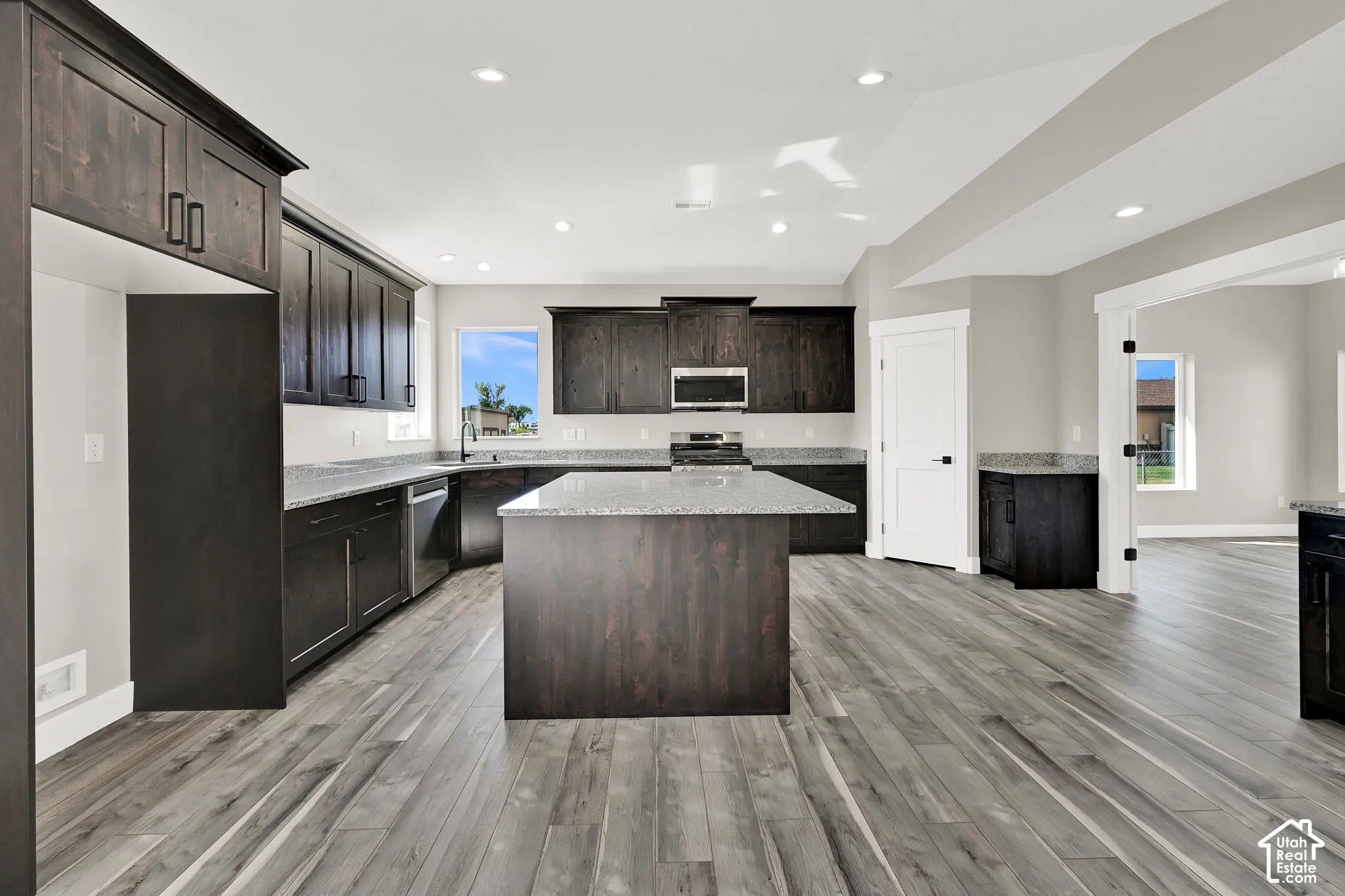 Large island provides a great workspace and in-kitchen seating.