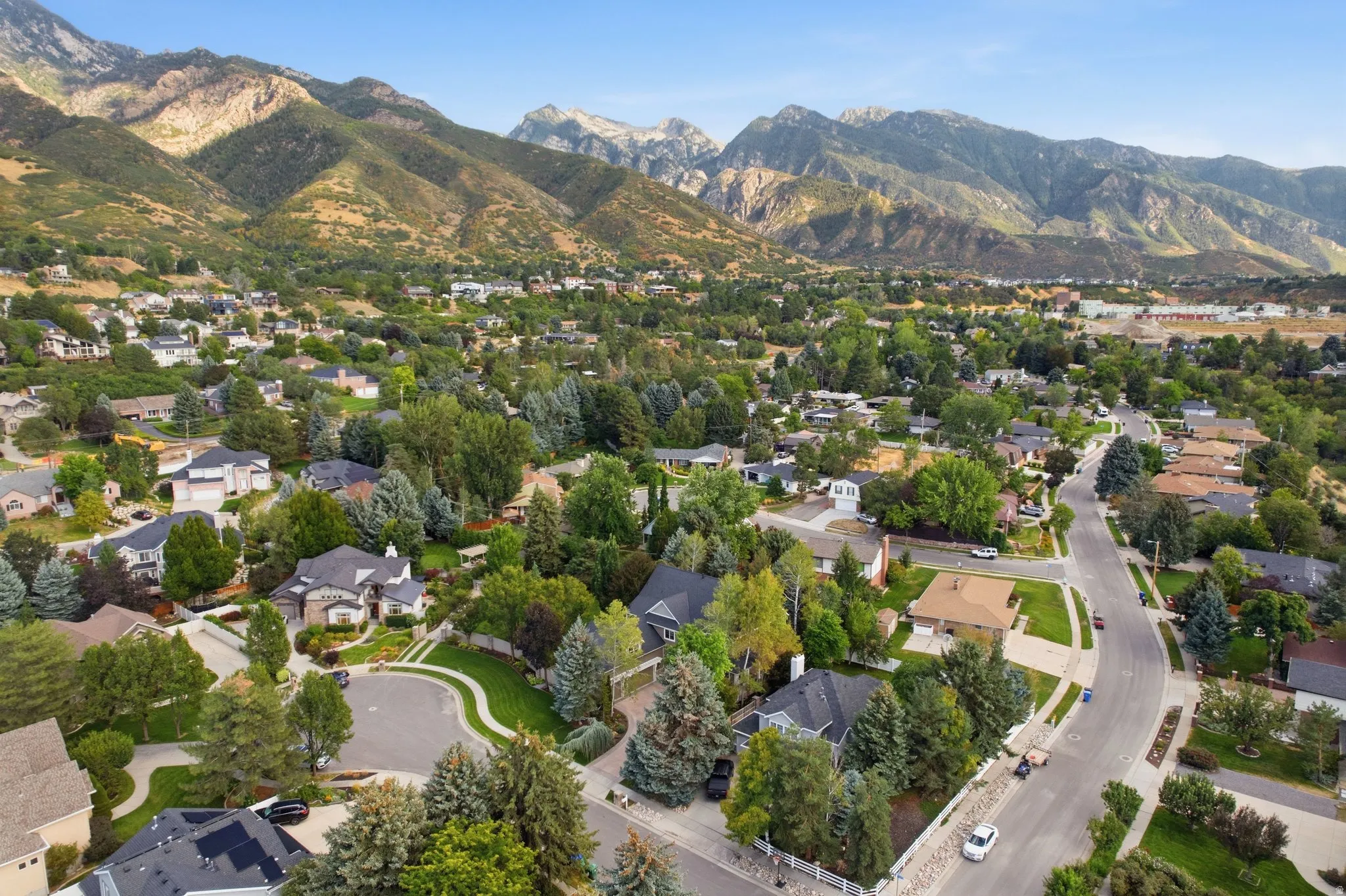 Neighborhood setting with established residential properties and surrounding mountainous terrain