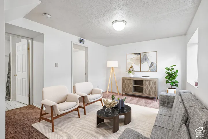 Recessed ceiling lighting, white interior doors, and a built-in wall niche