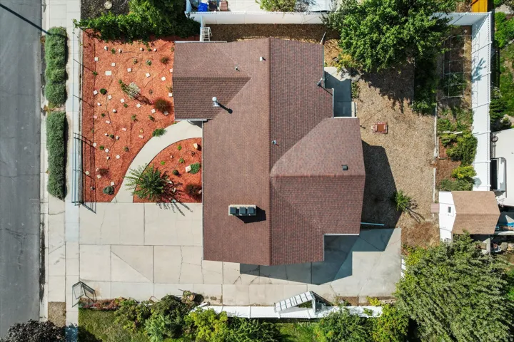 UPdated shingled roof with multiple gables