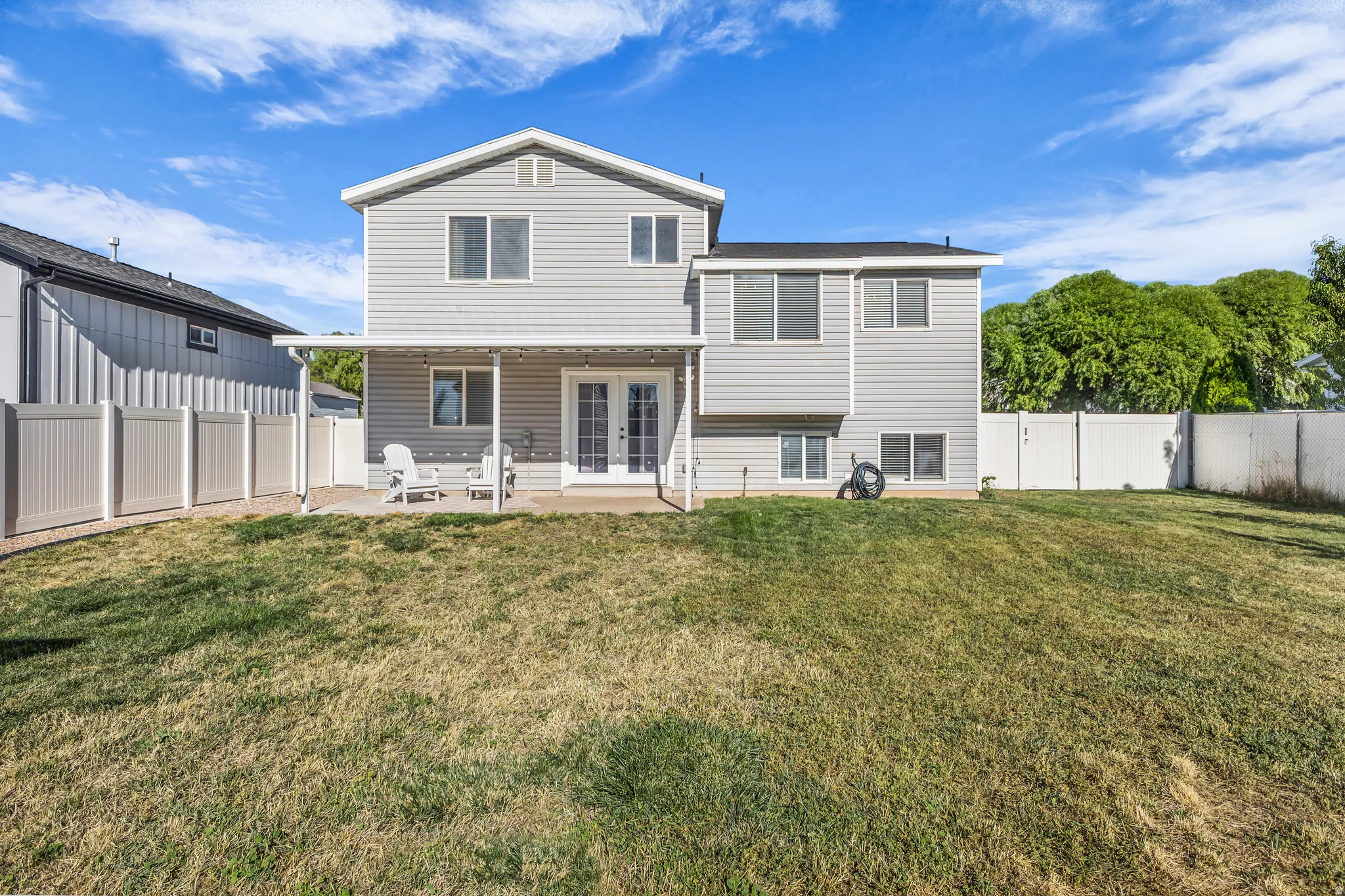 Two-story residence with siding exterior