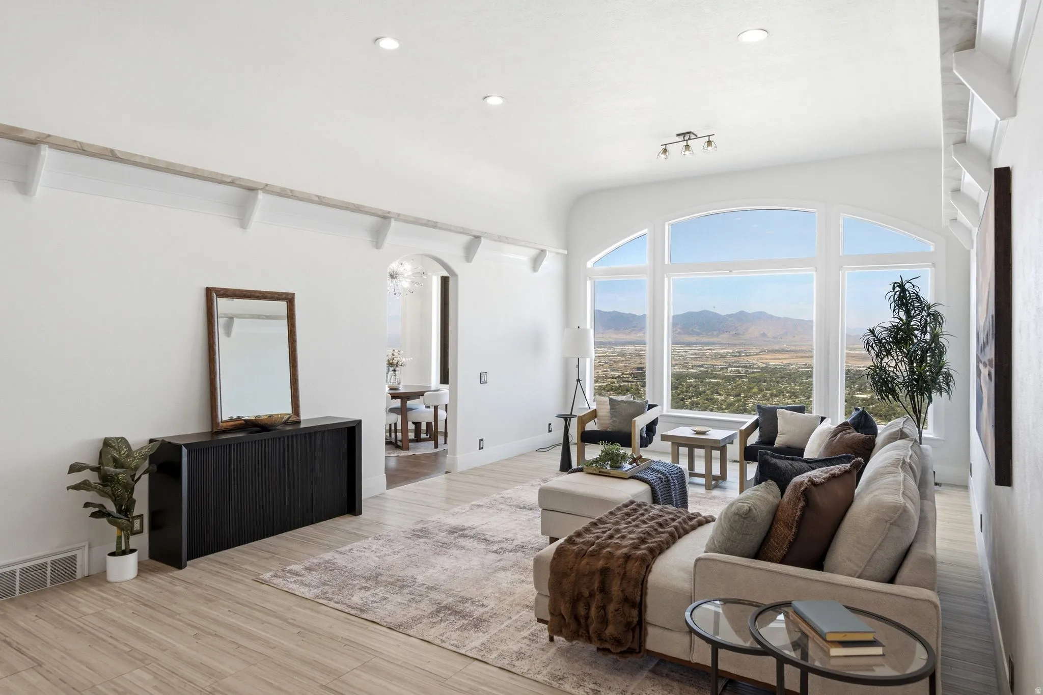 Arched picture windows with panoramic scenery