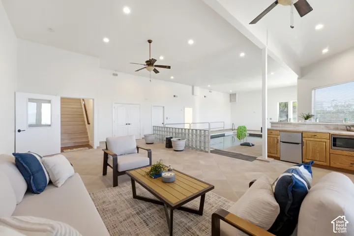 Recessed lighting, vaulted ceiling, and an indoor swimming pool