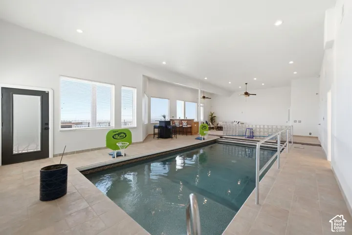 Indoor swimming pool with integrated steps and handrails