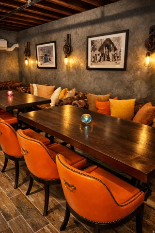 Exposed ceiling beams, textured wall finish, and wood-finish flooring