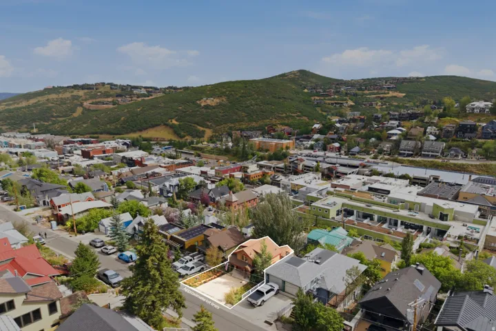 Aerial perspective of a developed urban area with surrounding hills
