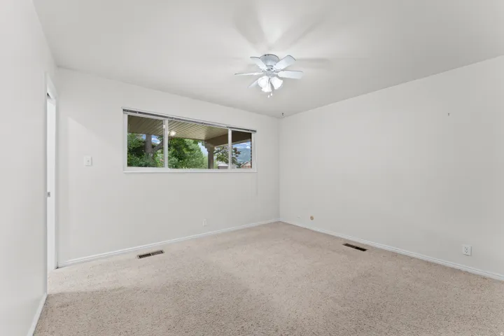 Neutral wall finishes and carpeted flooring