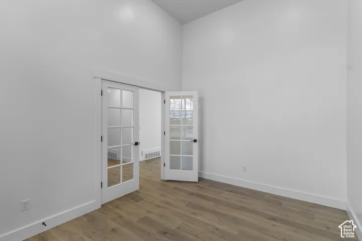 Vaulted ceilings and wood-finish flooring