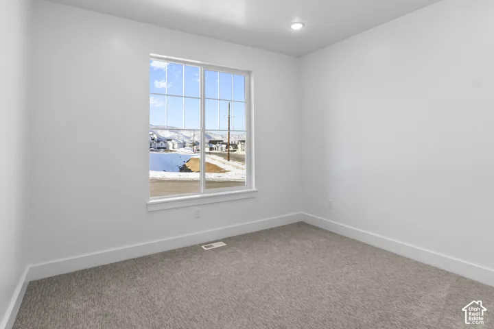Recessed ceiling light with a large window, providing natural illumination