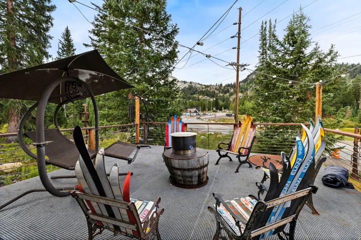 Outdoor deck with metal grate flooring