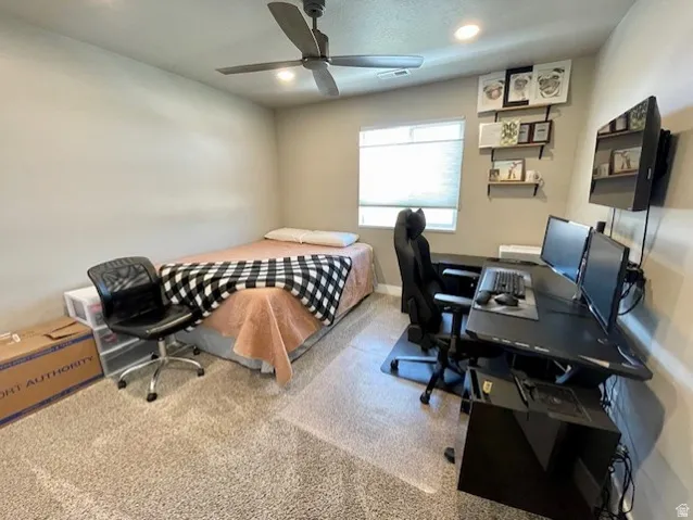 Bedroom # 4 - or a great office space with views from the window; Room featuring a ceiling fan with integrated lighting, recessed lighting, and a window with blinds