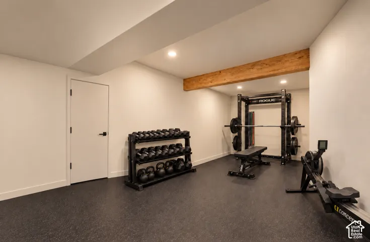 Virtually Staged. Currently unfinished mechanical room in the basement with additional sq footage and shows a possibility of what space could be used for.