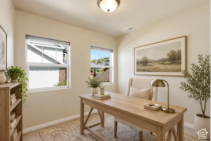 Virtually Staged. Upper level flex room, neutral interior room featuring two large windows and carpeted flooring. Office, study, game room, playroom