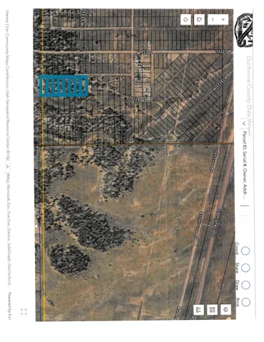 Duchesne County Data Viewer. Displaying an aerial map with parcel boundaries and highlighted property sections